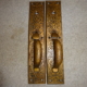Large set of matching door pulls with original two tone finish in excellent condition with thumb pieces showing some ware, backs are stamped with Y&T clover leaf logos Measure Both are 13" x 2-1/2" with 1" long thumb lever on backs, weigh 5lbs.