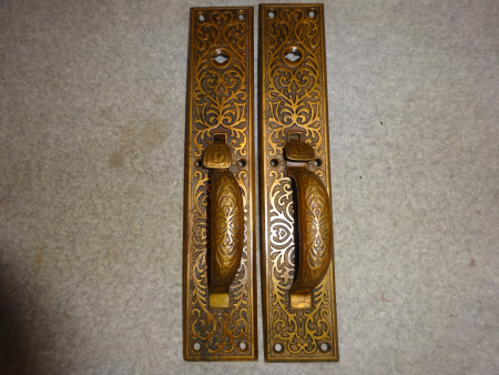 Large set of matching door pulls with original two tone finish in excellent condition with thumb pieces showing some ware, backs are stamped with Y&T clover leaf logos Measure Both are 13" x 2-1/2" with 1" long thumb lever on backs, weigh 5lbs.